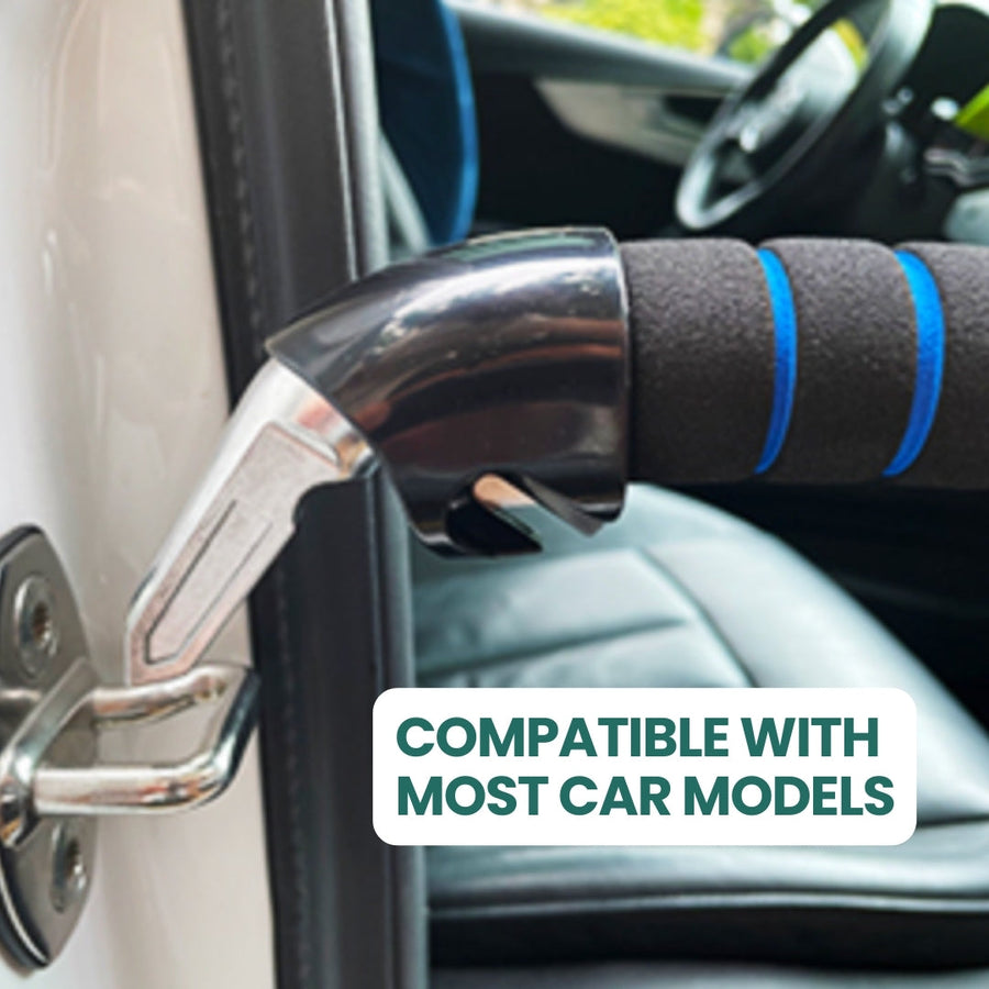 Close-up of the Renva handle's steel tip slotted into a car's U-shaped door striker